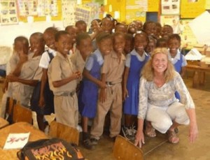 Jamaica Project leader, Pam, with Mason Hall school kids